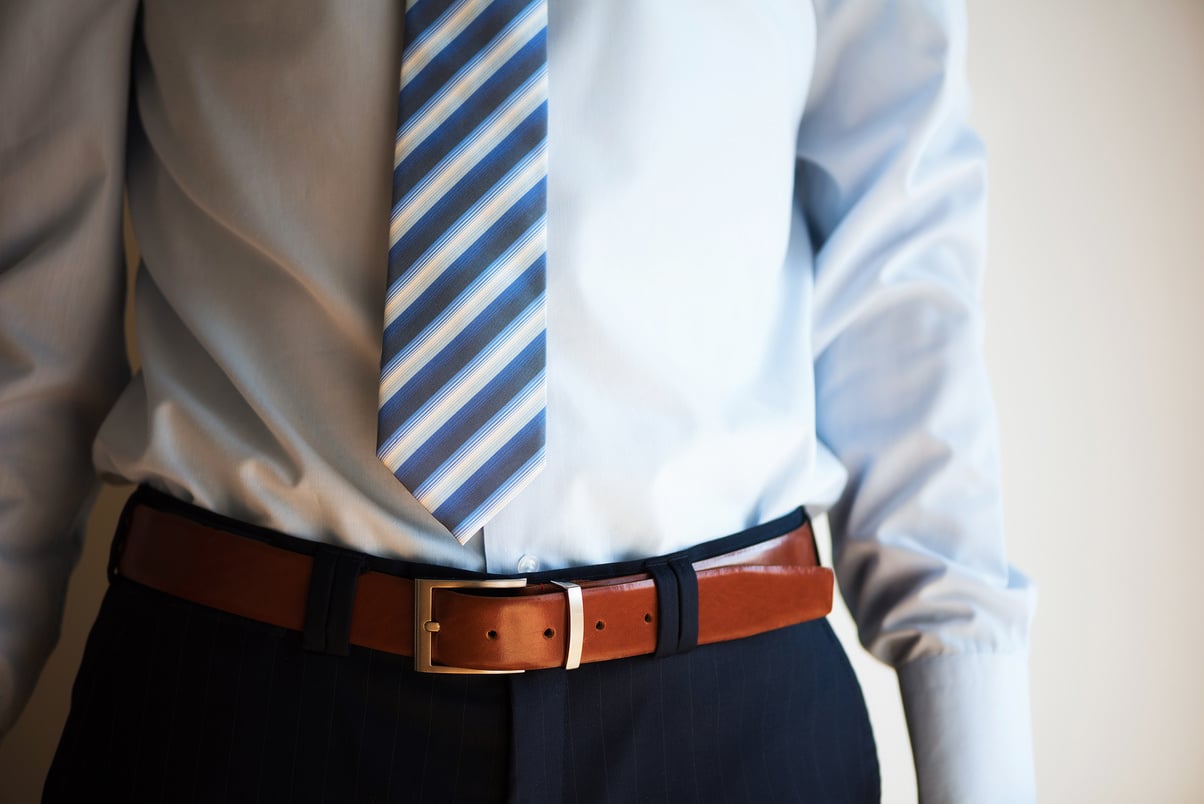 Man Wears Belt 