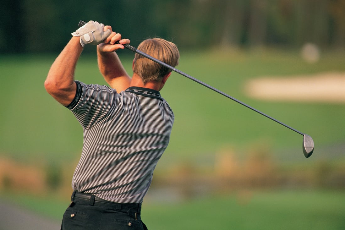 Man golfing